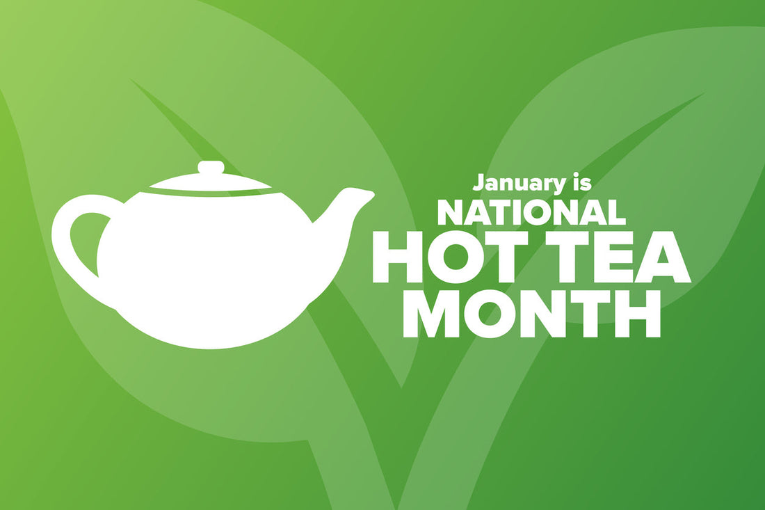 A white tea pot with the words "January is Hot Tea Month" on a green background of a tea leaf.